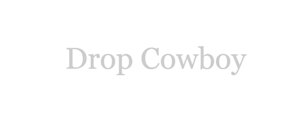 Text displaying DropCowboy in a serif font on a transparent background, enhanced with a touch of VoiceDrop flair. VoiceDrop Ringless Voicemails