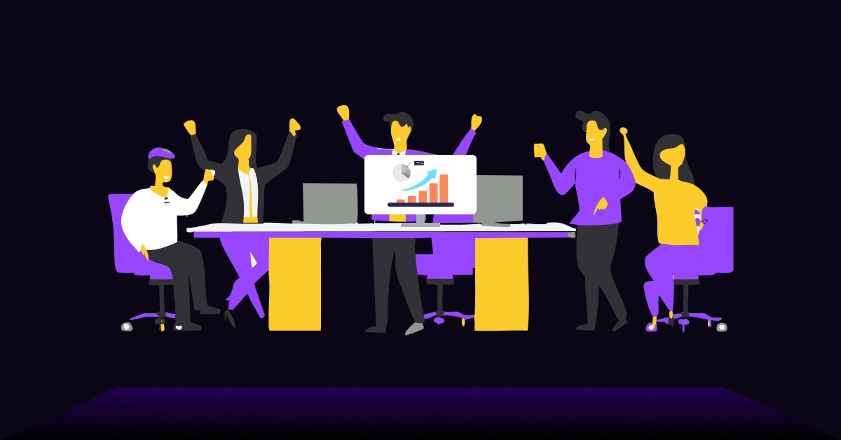 An illustration of five people in an office, celebrating the success of VoiceDrop vs VoiceMailDrops with raised hands. Gathered around a desk with two computers, one displaying a bar graph and pie chart, the scene is painted in vibrant purple and yellow tones against a dark background. VoiceDrop Ringless Voicemails