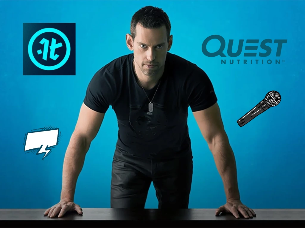 Tim Bilyeu, in a black t-shirt, leans forward with both hands on a table against a blue background. Surrounding him are a microphone, a speech bubble, and the logos for Quest Nutrition and Impact Theory. VoiceDrop Ringless Voicemails